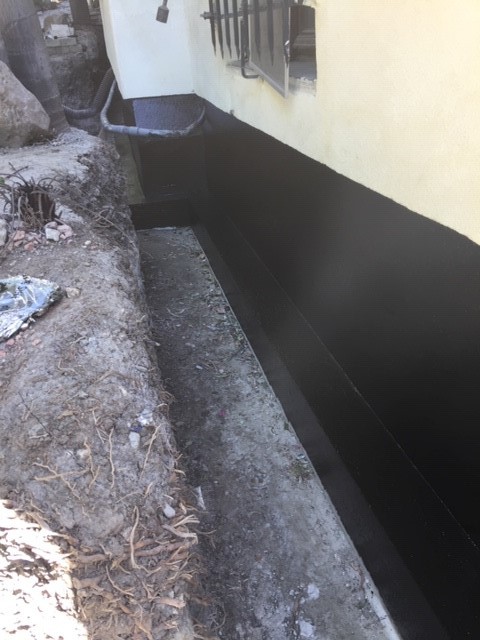 Drainage panels installed over foundation / footing waterproofing