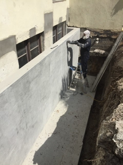 Light well foundation surface grinding / power washing complete