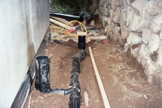 Foundation drainage down spout connection Foundation drainage down spout connection