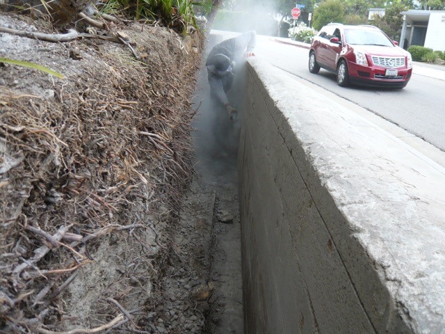 Surface grinding inside of planter wall