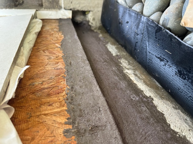 Application of fiberglass reinforced cementitious waterproofing