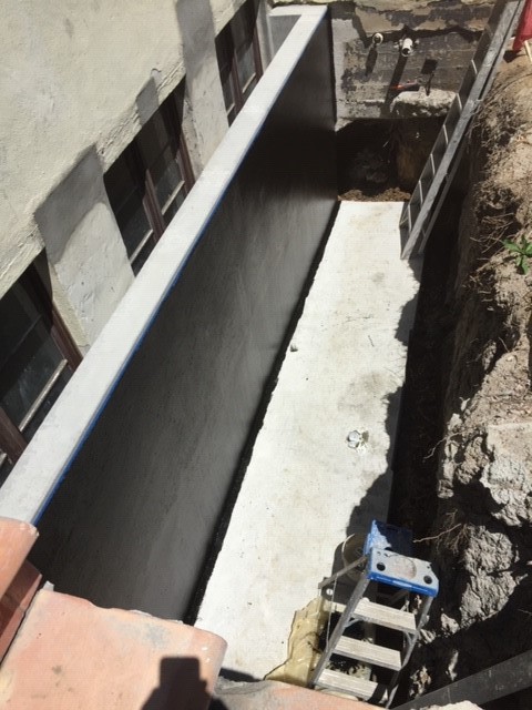 Light well foundation waterproofing application