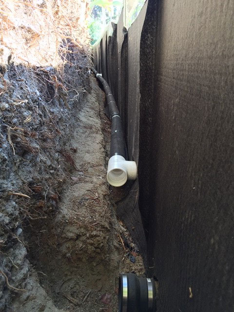 Curved planter wall french drains Curved planter wall french drains