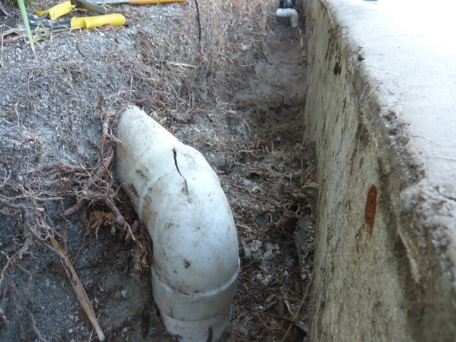 Cracked schedule 35 drain pipes in planter