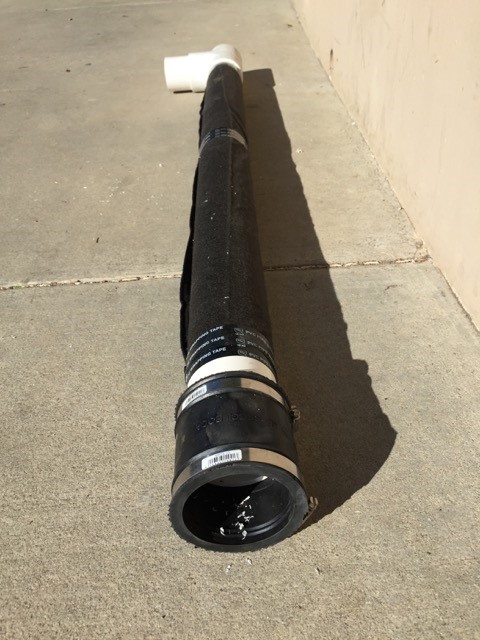 Section of french drain with rubber coupling connection