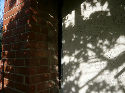 Removal of existing chimney flashing revealing a 2” gap at the stucco wall and chimney transition