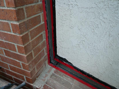 Installation of bonderized chimney, stucco wall transition flashing to prevent corrosion