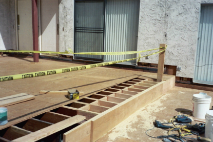 Structural blocking installed to reinforce deck step transition framing