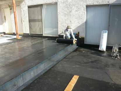 Application of sheet applied waterproofing membrane to deck step transition